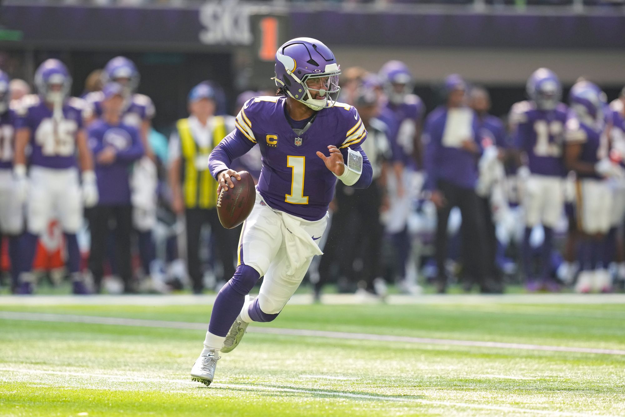 Kyler Murray rolling out with the football